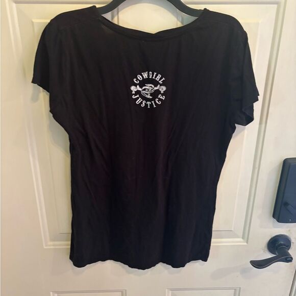 Cowgirl Justice “What Would Johnny Cash Do?” Black Graphic Tee with White Text - Picture 2 of 5